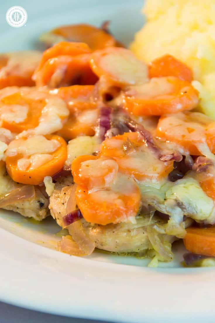 Our recipe for juicy chicken chops with carrots and cheddar cooks fast and tastes great with pasta or mashed potatoes. #chicken #dinner | countryhillcottage.com