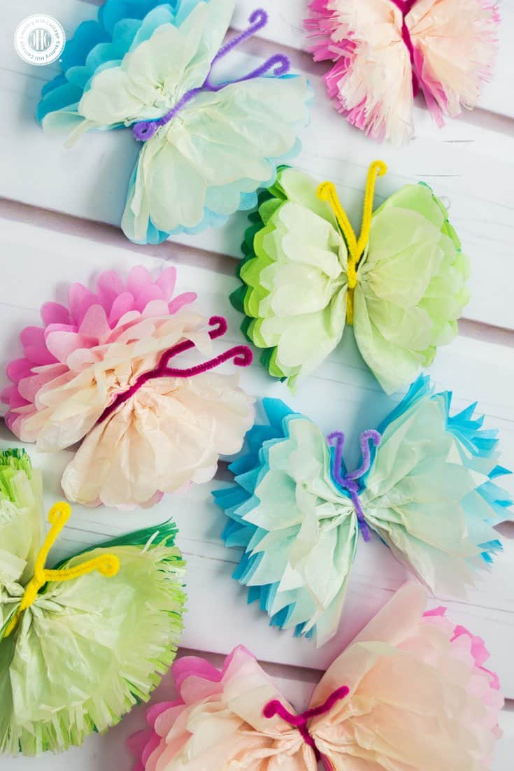 Frilly tissue paper butterflies are a beautiful decoration for parties and weddings! In this paper craft DIY, we show an easy technique to create colourful and elegant butterflies using tissue paper and pipe cleaner. #papercrafts #DIY #decor | countryhillcottage.com