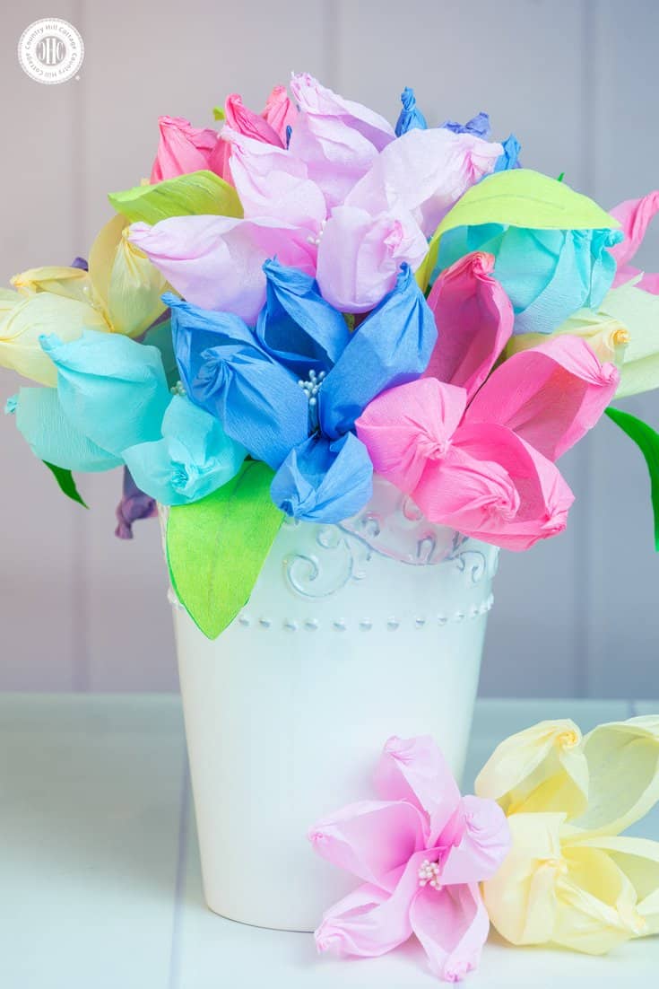 Learn to make the easiest crepe paper flowers ever using only a gold ball, and arrange them into beautiful centre pieces and paper flower bouquets! #crepepaper #paperflowers #papercrafts | countryhillcottage.com