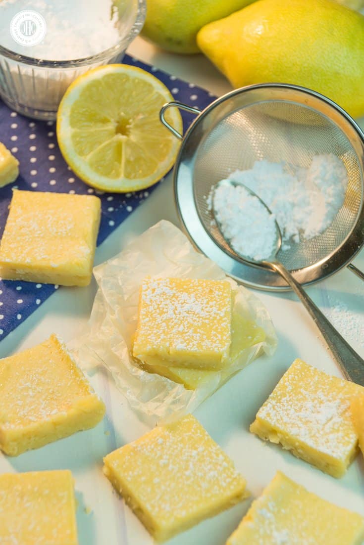 Layer a crumbly crust with a flavorful lemon topping to create creamy lemon squares! Dusted with icing sugar, these bars are perfect to serve with tea, or as a delicious present for all lemon lovers. You can find printable treat boxes to gift the lemon squares at our blog. #lemonsquares #baking #recipe | countryhillcottage.com Layer a crumbly crust with a flavorful lemon topping to create creamy lemon squares! Dusted with icing sugar, these bars are perfect to serve with tea, or as a delicious present for all lemon lovers. You can find printable treat boxes to gift the lemon squares at our blog. #lemonsquares #baking #recipe | countryhillcottage.com
