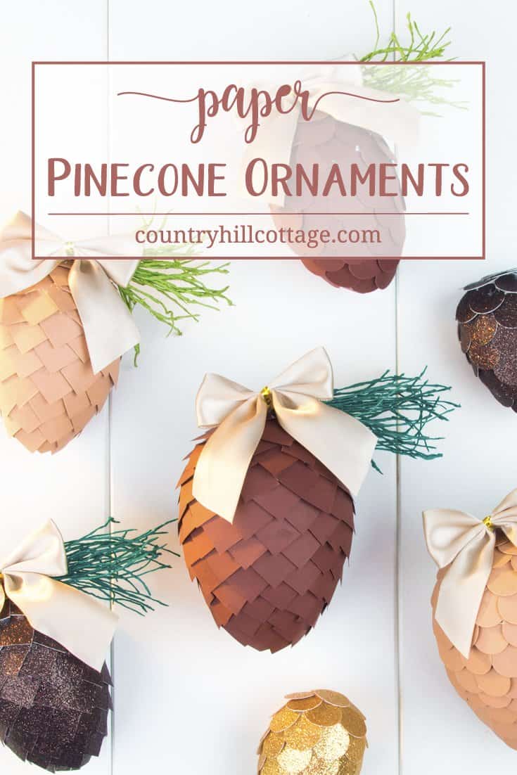 Learn how to make paper pinecone ornaments that you can use to decorate your Christmas tree or for packaging gifts. The ornaments are made by applying small paper squares or circles on polystyrene eggs. You can choose any size of egg shape and use a wide variety of papers for the scales, such as cardstock, scrapbook paper, glitter paper, or gift wrap. We also demonstrate how to make pine needles form crepe paper to decorate the ornaments. #DIY #pinecone #papercrafts | countryhillcottage.com