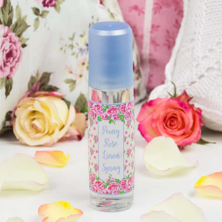 Looking for a quick way to freshen up the house? Then whip up our peony rose linen spray with essential oils! This DIY linen spray is made only with natural ingredients. It’s child-friendly and pet-safe. Mist pillows, blankets, shower curtains, sofas. Spray it on linens before ironing or the little one’s stuffed animals. Use our free printable label decorate the linen spray. #linenspray #pillowmist #peony #rose #diy #printables #diygift | countryhillcottage.com