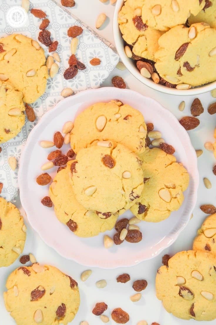 Raisin pine nut biscuits are the perfect accompaniment for tea or after-dinner treat with a glass of dessert wine. These two-bite cookies are made with a flavourful combination of maize flour, raisins, pine nuts, and hints of lemon and vanilla. #cookie #biscuit #cornflour #bakingrecipe #foodgift | countryhillcottage.com Raisin pine nut biscuits are the perfect accompaniment for tea or after-dinner treat with a glass of dessert wine. These two-bite cookies are made with a flavourful combination of maize flour, raisins, pine nuts, and hints of lemon and vanilla. #cookie #biscuit #cornflour #bakingrecipe #foodgift | countryhillcottage.com