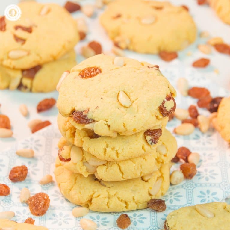 Raisin pine nut biscuits are the perfect accompaniment for tea or after-dinner treat with a glass of dessert wine. These two-bite cookies are made with a flavourful combination of maize flour, raisins, pine nuts, and hints of lemon and vanilla. #cookie #biscuit #cornflour #bakingrecipe #foodgift | countryhillcottage.com