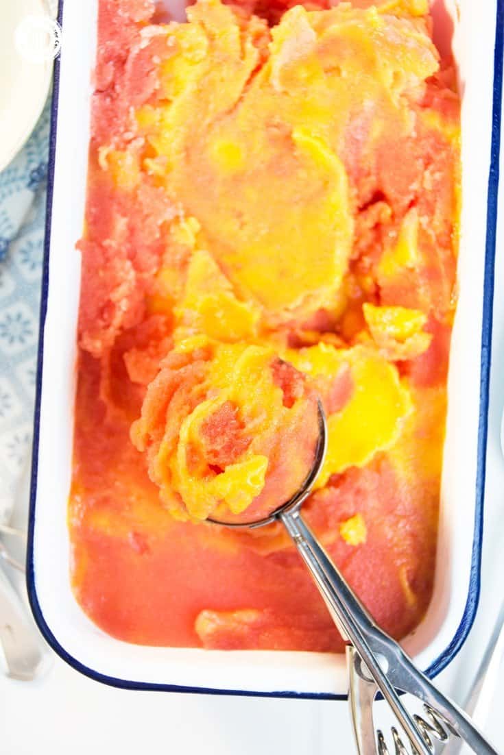 Stay cool with scoops of refreshing and healthy watermelon mango sorbet! Watermelon and mango are a wonderful flavour combination and the sorbet is super easy to prepare. This frozen treat is vegan, and you only need two ingredients to whip up a batch. No ice cream maker is required just fresh or frozen water melon and mango chunks. #mango #watermelon #sorbet #icecream | countryhillcottage.com Stay cool with scoops of refreshing and healthy watermelon mango sorbet! Watermelon and mango are a wonderful flavour combination and the sorbet is super easy to prepare. This frozen treat is vegan, and you only need two ingredients to whip up a batch. No ice cream maker is required just fresh or frozen water melon and mango chunks. #mango #watermelon #sorbet #icecream | countryhillcottage.com