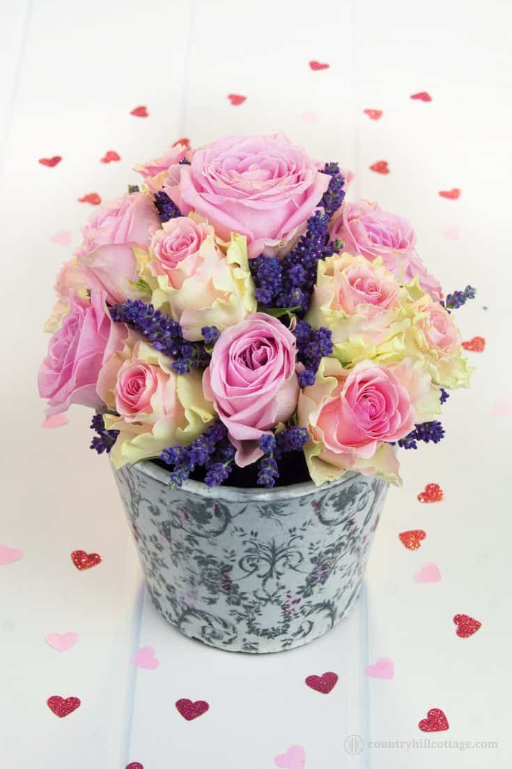 Heavenly scented roses and lavender are combined into a beautiful DIY rose lavender bouquet. The fragrance of lavender is warm and summery, and the tiny florets just look so darling. This homemade flower arrangement is a great little present for birthdays, to say thank you, wish a sweet one well, or a pretty hostess gift. This flower DIY comes with a coordinated free printable greeting card. #roses #lavender #bouquet #flowerarranging #giftgiving| countryhillcottage.com Heavenly scented roses and lavender are combined into a beautiful DIY rose lavender bouquet. The fragrance of lavender is warm and summery, and the tiny florets just look so darling. This homemade flower arrangement is a great little present for birthdays, to say thank you, wish a sweet one well, or a pretty hostess gift. This flower DIY comes with a coordinated free printable greeting card. #roses #lavender #bouquet #flowerarranging #giftgiving| countryhillcottage.com