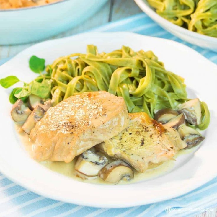 Turkey cutlets with mushrooms gravy are incredibly easy to make and done in under one hour. Button mushrooms, onions, and cream create a delicious gravy, which drenches the juicy cutlets rich, flavourful goodness. And as the turkey chops simmer in the tasty gravy, there’s zero chance the meat dries out. You can prepare the recipe with both turkey and chicken cutlets. #turkey #mushrooms #gravy #mushroomgravy | countryhillcottage.com