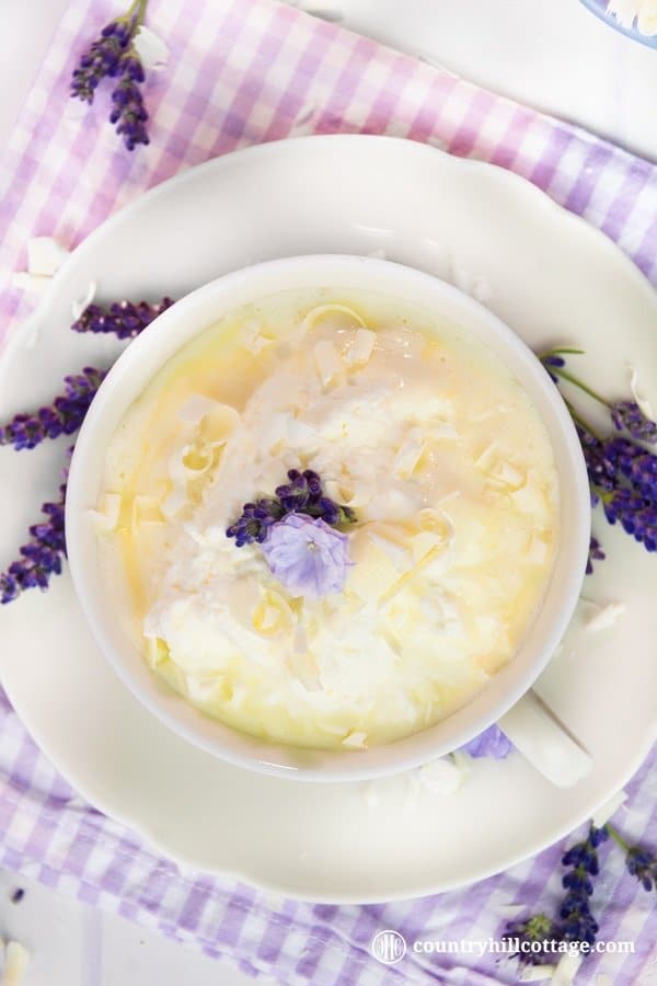 White lavender hot chocolate is a wonderful hot drink recipe for all seasons of the year! It’s the perfect autumn drink recipe to make cool autumn night cosier and a lovely treat throughout the holiday season. Served cold with vanilla ice cream, this hot chocolate is also a great summer refreshment. The recipe comes with free printable labels to package the hot chocolate mix for gift giving. #hotchocolate #lavender #essentialoil #hotchocolatemix #foodgifts | countryhillcottage.com White lavender hot chocolate is a wonderful hot drink recipe for all seasons of the year! It’s the perfect autumn drink recipe to make cool autumn night cosier and a lovely treat throughout the holiday season. Served cold with vanilla ice cream, this hot chocolate is also a great summer refreshment. The recipe comes with free printable labels to package the hot chocolate mix for gift giving. #hotchocolate #lavender #essentialoil #hotchocolatemix #foodgifts | countryhillcottage.com