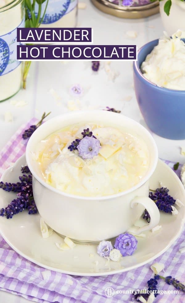 White lavender hot chocolate is a wonderful hot drink recipe for all seasons of the year! It’s the perfect autumn drink recipe to make cool autumn night cosier and a lovely treat throughout the holiday season. Served cold with vanilla ice cream, this hot chocolate is also a great summer refreshment. The recipe comes with free printable labels to package the hot chocolate mix for gift giving. #hotchocolate #lavender #essentialoil #hotchocolatemix #foodgifts | countryhillcottage.com White lavender hot chocolate is a wonderful hot drink recipe for all seasons of the year! It’s the perfect autumn drink recipe to make cool autumn night cosier and a lovely treat throughout the holiday season. Served cold with vanilla ice cream, this hot chocolate is also a great summer refreshment. The recipe comes with free printable labels to package the hot chocolate mix for gift giving. #hotchocolate #lavender #essentialoil #hotchocolatemix #foodgifts | countryhillcottage.com