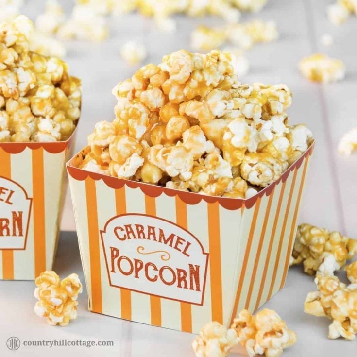 Homemade caramel popcorn is sweet, crunchy and hard to stop eating! This yummy snack is easy to whip up: pop the kernels or use premade popcorn. Then cook a thick caramel sauce with brown sugar and butter and toss the popcorn in the sauce. The recipe includes a printable retro popcorn box for gift giving or to serve at your next movie. Check out the recipe and learn how to make caramel popcorn from scratch. #caramelpopcorn #caramel #popcorn #foodgifts | countryhillcottage.com