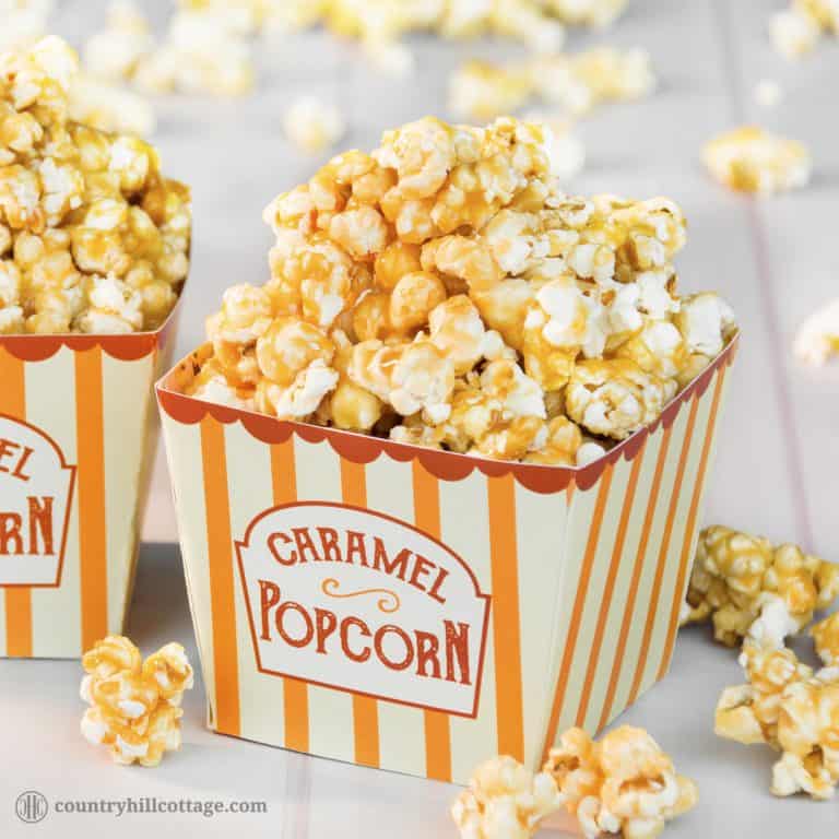Homemade caramel popcorn is sweet, crunchy and hard to stop eating! This yummy snack is easy to whip up: pop the kernels or use premade popcorn. Then cook a thick caramel sauce with brown sugar and butter and toss the popcorn in the sauce. The recipe includes a printable retro popcorn box for gift giving or to serve at your next movie. Check out the recipe and learn how to make caramel popcorn from scratch. #caramelpopcorn #caramel #popcorn #foodgifts | countryhillcottage.com
