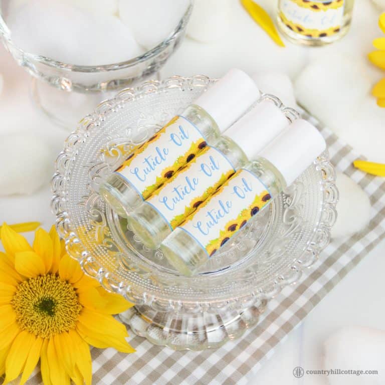 Strengthen and moisturise your nails and cuticles with a nourishing DIY cuticle oil with essential oils. This natural nail care recipe is an excellent homemade remedy to soften dry skin and cuticles, to care for cracked, brittle nails and to promote healthy nail growth. Only 5 minutes need to make this easy homemade nail serum, can be used daily. Instructions explain how to use the oil & include printable labels. #nailcare #nails #cleanbeauty #essentialoils #cuticlebalm | countryhillcottage.com