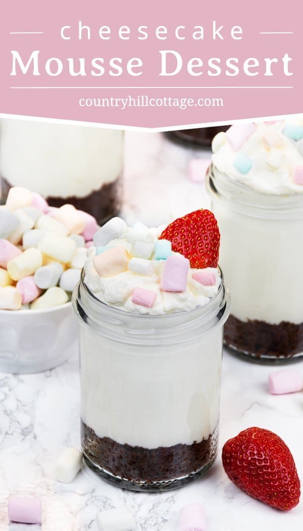 No-Bake Cheesecake Mousse Dessert Jars are made with a crunchy cookie crust, a creamy cheesecake mousse, and garnished with berries and mini marshmallows. It only takes a few minutes to prepare this cheesecake dessert and there are many ways to customise the recipe according to your taste or the season of the year. No-bake cheesecake mousse is perfect for many occasions can be served after dinner, at parties, and dessert tables. #nobake #cheesecake #mousse #dessert | countryhillcottage.com No-Bake Cheesecake Mousse Dessert Jars are made with a crunchy cookie crust, a creamy cheesecake mousse, and garnished with berries and mini marshmallows. It only takes a few minutes to prepare this cheesecake dessert and there are many ways to customise the recipe according to your taste or the season of the year. No-bake cheesecake mousse is perfect for many occasions can be served after dinner, at parties, and dessert tables. #nobake #cheesecake #mousse #dessert | countryhillcottage.com