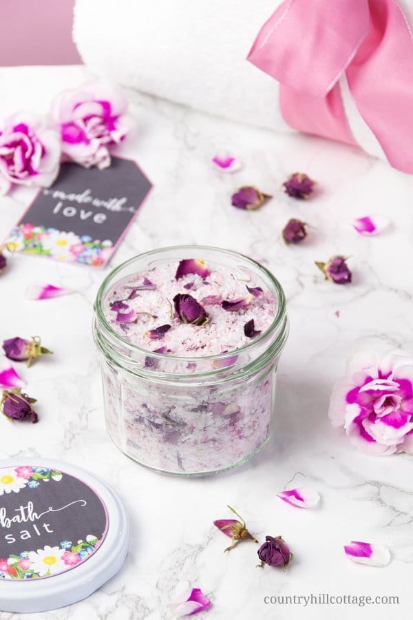 A DIY spa kit is perfect for a spa day at home and a lovely homemade gift idea for mom and friends. The quick beauty recipes are made with affordable ingredients and include: a whipped body butter with shea butter and coconut oil, a simple DIY vanilla sugar scrub recipe and an easy DIY Epsom bath salt with baking soda and essential oils. The beauty products are packaged in cute jars and come with free printable labels. #bodybutter #bathsalt #sugarscrub #essentialoils| countryhillcottage.com