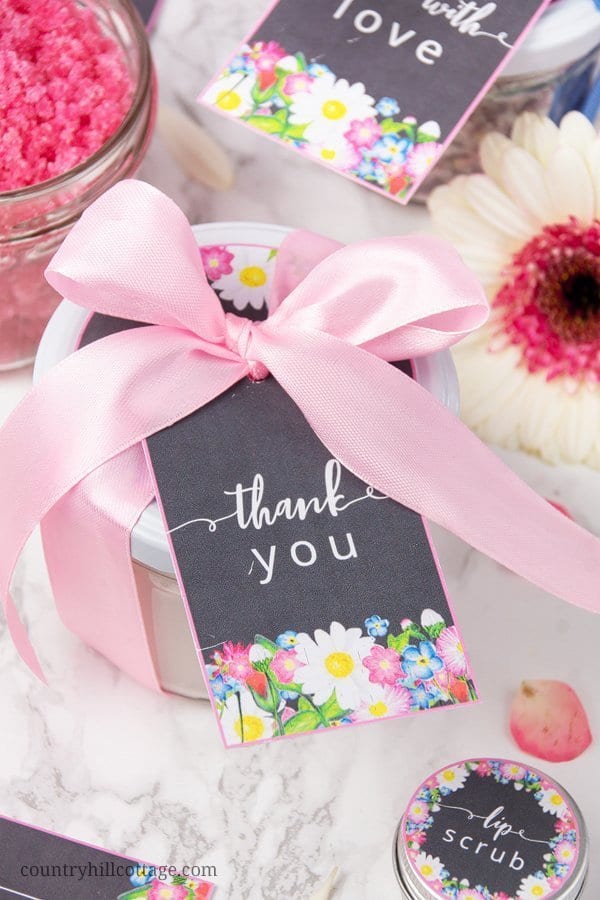 A DIY spa kit is perfect for a spa day at home and a lovely homemade gift idea for mom and friends. The quick beauty recipes are made with affordable ingredients and include: a whipped body butter with shea butter and coconut oil, a simple DIY vanilla sugar scrub recipe and an easy DIY Epsom bath salt with baking soda and essential oils. The beauty products are packaged in cute jars and come with free printable labels. #bodybutter #bathsalt #sugarscrub #essentialoils| countryhillcottage.com