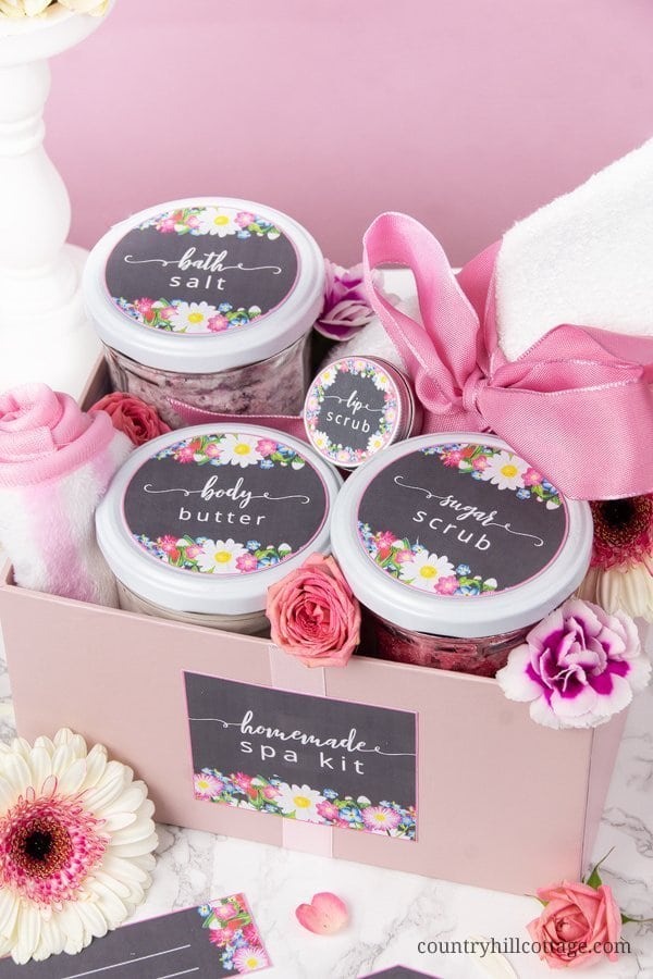 A DIY spa kit is perfect for a spa day at home and a lovely homemade gift idea for mom and friends. The quick beauty recipes are made with affordable ingredients and include: a whipped body butter with shea butter and coconut oil, a simple DIY vanilla sugar scrub recipe and an easy DIY Epsom bath salt with baking soda and essential oils. The beauty products are packaged in cute jars and come with free printable labels. #bodybutter #bathsalt #sugarscrub #essentialoils| countryhillcottage.com