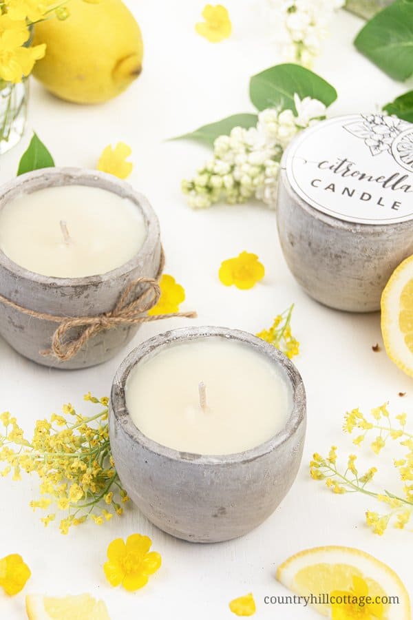 See how to make the best DIY citronella candles with essential oils that repel mosquitos! These non-toxic outdoor candles are a natural bug repellent and ward off mosquitoes and other insects. The homemade citronella candle recipe is a summer patio and party staple to protect you from pesky bug bites! The easy soy candle making tutorial includes tips for mason jars, fragrance scent blends and printable labels for gifts. A great beginner candle making recipe! #candles | countryhillcottage.com