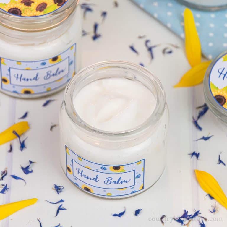 Formulated with natural ingredients and essential oils, this easy homemade hand cream moisturises and revitalizes tough, dried out hands. The non greasy DIY hand lotion absorbs quickly and locks moisture in the skin, making your hands feel silky smooth and healthy. Learn how to make this lotion recipe perfect for dry skin and anti aging. This beauty products also make a cute gift and comes with a packaging idea. #handcream #lotion #moisturizer #essentialoils #skincare | countryhillcottage.com