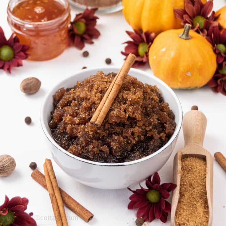 Learn how to make DIY pumpkin spice sugar scrub with organic honey! Made with essential oils & cinnamon, this easy natural brown sugar scrub recipe is perfect for autumn skincare and glowing, smooth skin. The simple homemade body scrub is great for hands, legs, lips, and can be used for kids and sensitive or dry skin. The exfoliating scrub looks cute in jars with free printable labels as Christmas gift! #sugarscrub #essentialoils #bodyscrub #pumpkinspice #skincare #fall | countryhillcottage.com