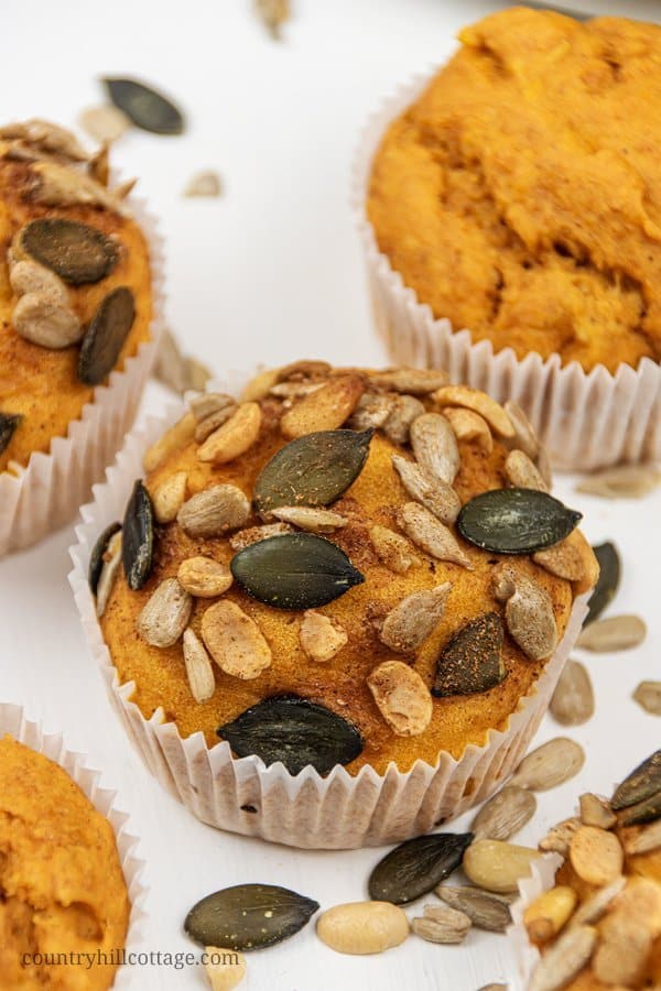 Healthy pumpkin muffins are moist & delicious! This easy pumpkin muffins recipe is vegan, gluten free, refined sugar-free, eggless and so simple to make from scratch. Homemade pumpkin spice muffins are a nutritious breakfast idea and a healthy snack. With options for applesauce, chocolate chips, cream cheese frosting, streusel topping, oily free & sugar free. Great for kids & clean eating. #muffins #pumpkin #pumpkinmuffins #vegan #glutenfree #pumpkinspice #cleaneating | coun-tryhillcottage.com