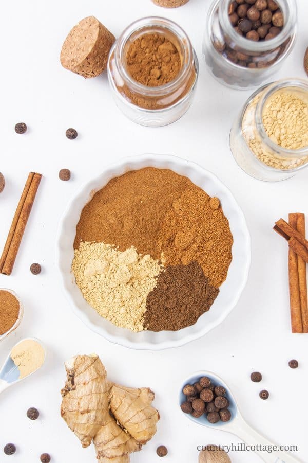 How to make pumpkin pie spice: Evoke the taste of autumn with homemade pumpkin pie spice, an aromatic mix of cinnamon, ginger, nutmeg and allspice. This warm DIY spice blend recipe adds fall flavor to seasonal baking and desserts, from latte to cookies, cakes, syrup, coffee and muffins. Quick and easy, pumpkin spice can be made without allspice too. Vegan, gluten free, grain free, low carb, paleo & keto friendly. #pumpkinspice #pumpkinpiespice #spiceblend #baking #fall | countryhillcottage.com