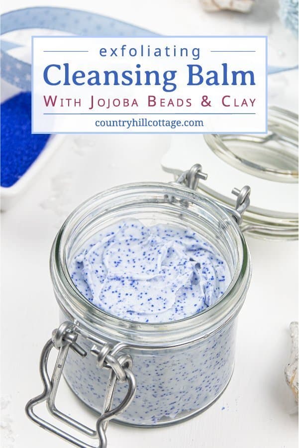 Learn how to make an exfoliating DIY cleansing balm with jojoba beads! This vegan facial scrub is a four-in-one treatment: the non-comedogenic oils are a make up remover and natural skincare moisturizer, kaolin clay draws out impurities and cleanses, and the jojoba beads exfoliate your face. This gentle face polish recipe and non-abrasive homemade exfoliator is suitable for dry skin, oily skin, and acne. #cleansingbalm #facescrub #facialscrub #facepolish #jojobabeads | countryhillcottage.com