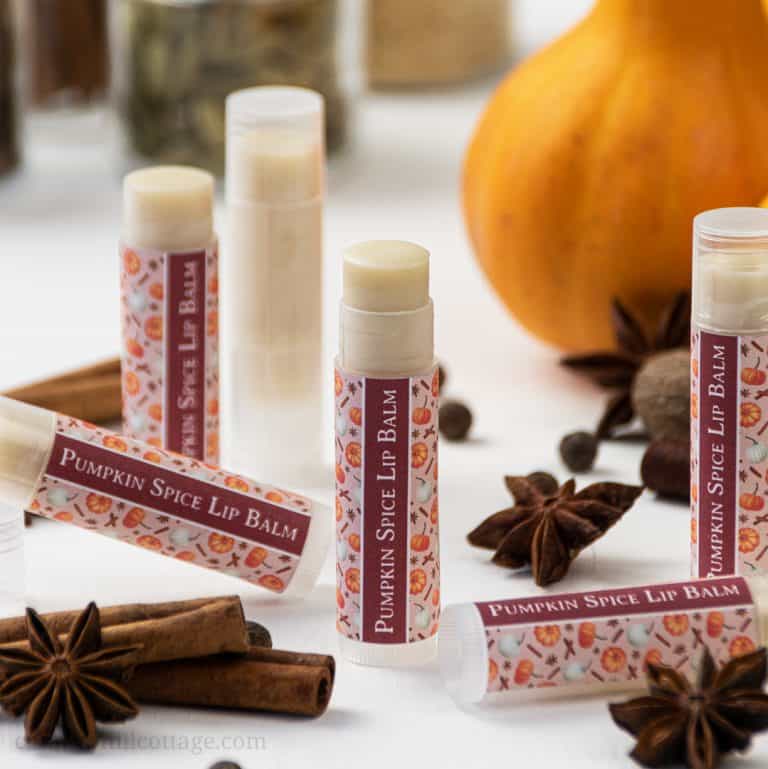 Learn how to make an easy natural DIY pumpkin spice lip balm. The moisturizing and healing lip balm recipe is made with hydrating shea butter, organic beeswax, cocoa and mango butter. The homemade Chapstick is made in the microwave with plumping cinnamon and flavored with essential oils. The step-by-step tutorial includes labels for packaging the containers or tubes. Great for kids, winter and a lovely gift for Christmas. #lipbalm #essentialoils #pumpkinspice #fall | countryhillcottage.com