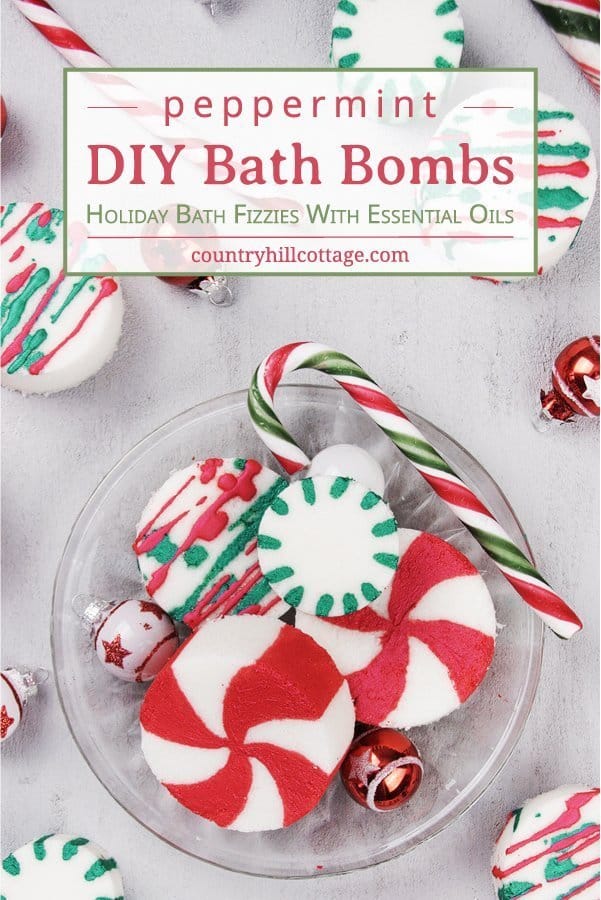 See how to make DIY peppermint bath bombs with essential oils! You learn how to make an easy homemade candy cane essential oil blend and tricks to paint the bath fizzies with mica for pretty bath fizzies! This easy Christmas bath bomb recipe looks and smells very festive and is an excellent handmade bath gift idea for the holiday season. Great for kids. With storage tips, packaging ideas and printable gift tags. #peppermint #bathbombs #Christmas #gift #essentialoils | countryhillcottage.com