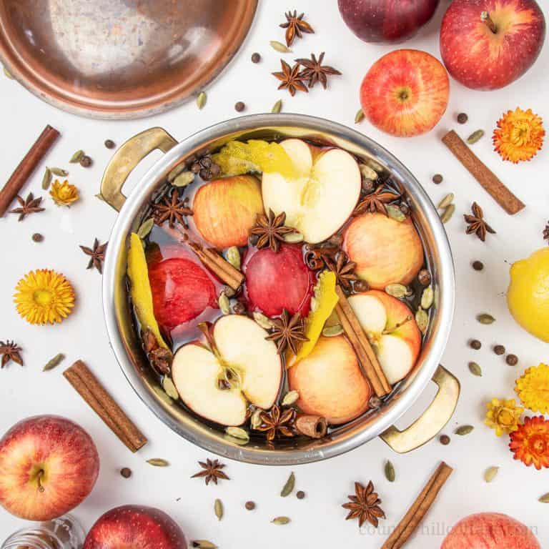 Enjoy the sweet smell of apples and warming spices in a fragrant fall stovetop potpourri. In this easy DIY, learn how to make a stovetop potpourri recipe and make your house smell clean and amazing. This homemade air freshener simmer pot is a great way to home fragrance naturally. The materials include fresh fruits, lemon peel, cinnamon and other dried spices. Optionally essential oils, rosemary, orange or vanilla. #potpourri #airfreshener #stovetoppotpourri #simmerpot | countryhillcottage.com