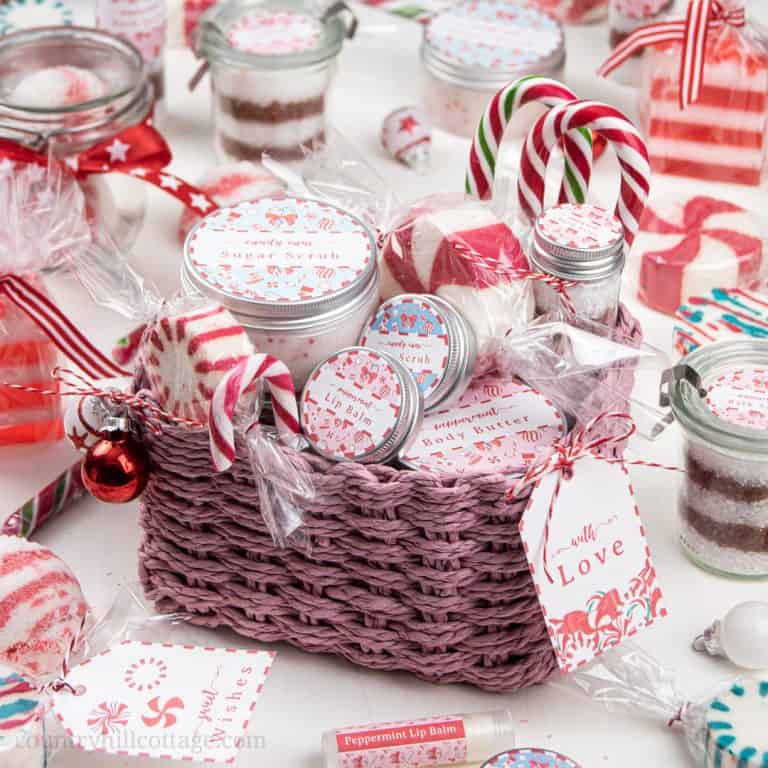 See how to make holiday spa gift set with homemade beauty gifts! This girly and cute candy cane themed relaxation gift box is an inexpensive DIY Christmas gift basket for women, girls, mom, teenagers, friends, teachers, coworkers, and neighbors. This easy relaxation gift basket idea is a unique, elegant present to pamper someone special. Includes gift wrapping ideas and free printables. #spagiftbasket #relaxationgiftbox #homemadespagiftbasket #giftbasket #Christmasgift | countryhillcottage.com