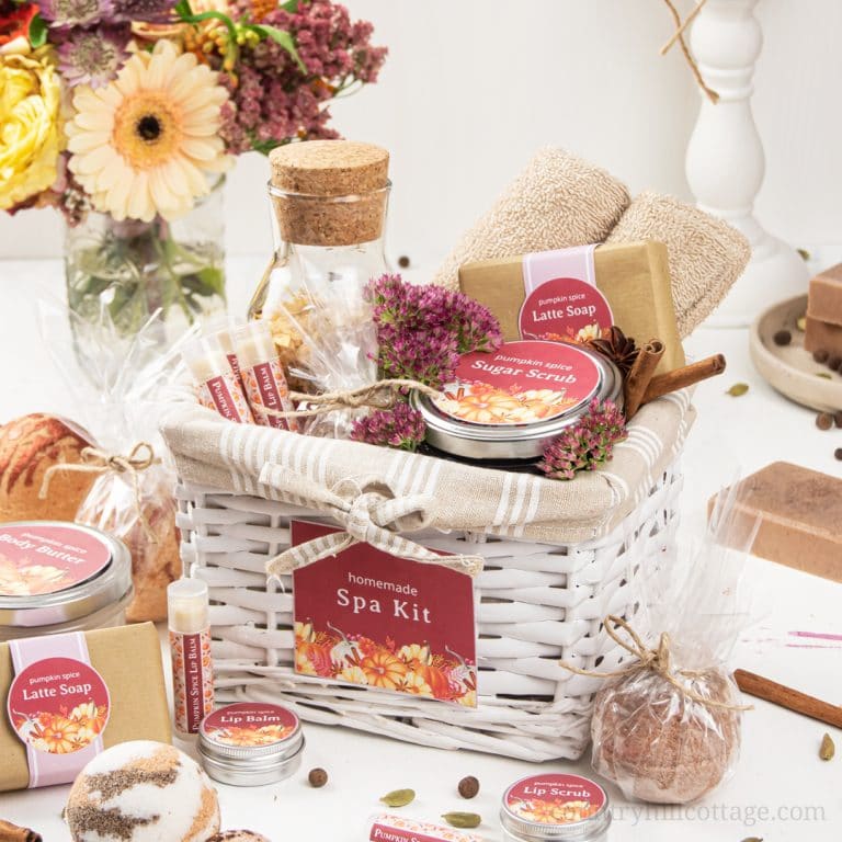 A DIY beauty fall gift basket is a great homemade autumn gift idea! Learn 6 natural pumpkin spice gifts for a relaxing spa kit set. Included are easy skincare recipes for handmade soap, bath bombs, sugar scrub in a jar, body butter, lip balm bath salt and free printable labels for packaging. A cozy beauty hamper is a gift basket idea for women, for her, for men, for him, for girlfriend, for office, Thanksgiving. #giftbasket #beautyhamper #homemadegift #giftideas #spakit | countryhillcottage.com