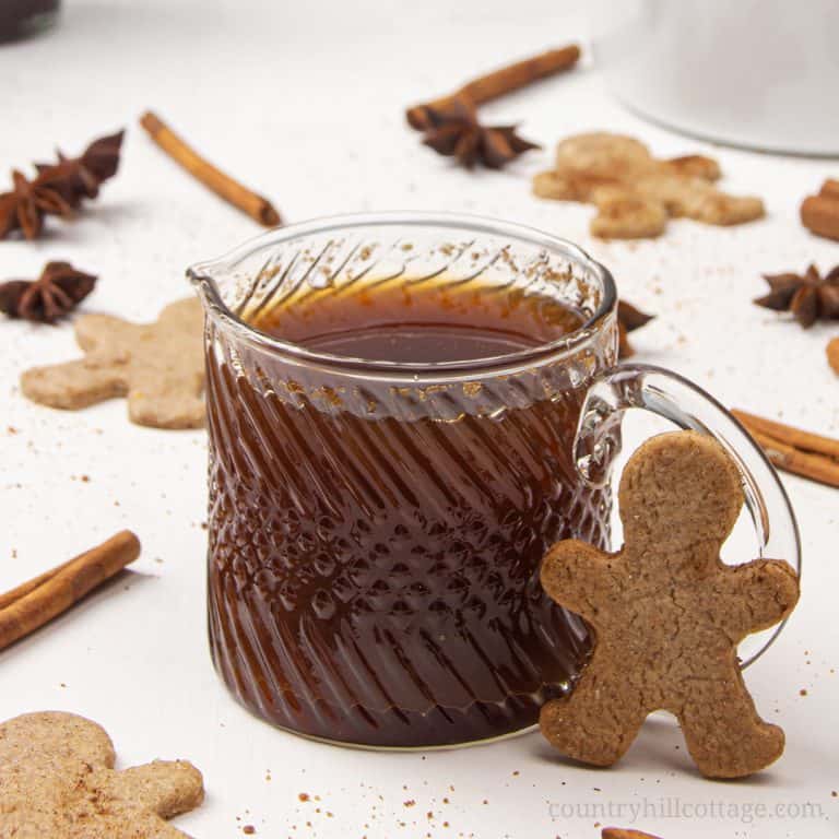 See how to make gingerbread syrup! This healthy Christmas syrup is packed with holiday flavours like cinnamon and vanilla. Use this spiced syrup for pancake, waffle, ice cream, desserts, drinks, coffee, latte, cocktails. The homemade syrup recipe is vegan, gluten-free, refined sugar-free, paleo-friendly. The recipe also includes instructions for keto low carb sugar-free gingerbread syrup and free printable labels for gift giving. #gingerbread #syrup #homemade #holidays | countryhillcottage.com