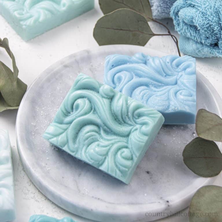 How to make natural sea salt soap hand and body bars! An easy DIY sea salt soap recipe with pink Himalayan sea salt, moisturizing shea butter, essential oils and goats milk or glycerin base. The homemade melt and pour soap is an easy soap making tutorial for beginners and has benefits for acne, eczema, and dry skin. Great for men, kids and gifts. With tips for swirls molds, how to store, packaging ideas and more recipes inspiration. #soap #saltbar #saltsoap #soapmaking | countryhillcottage.com
