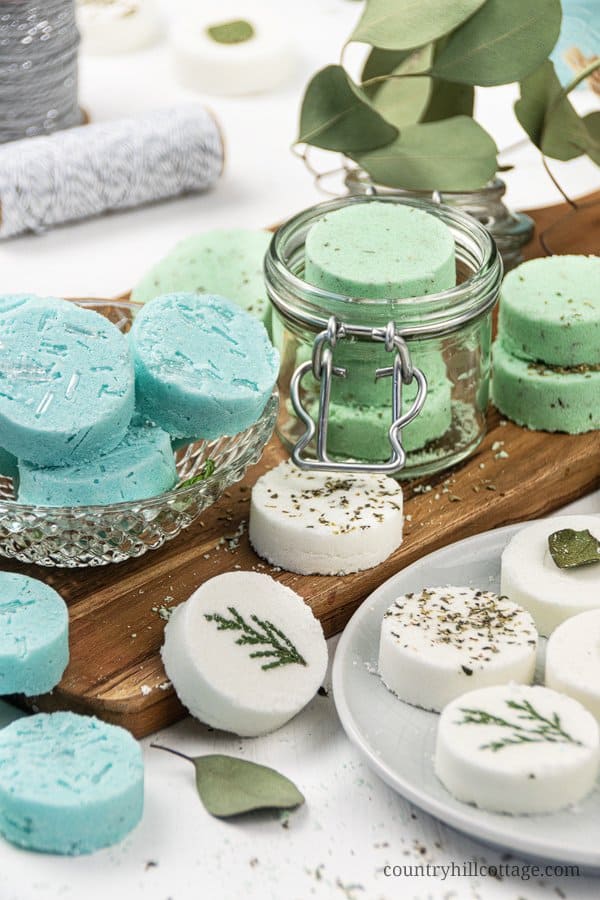 See how to make and how to use the best DIY shower steamers for health and wellness recipes. Made with cornstarch and baking soda, quick and easy natural shower bombs are good for colds, sinus congestion, headache or as Christmas gift. Relaxing homemade essential oils aromatherapy shower melt scents include decongestant eucalyptus and peppermint-menthol - like Vicks vapor rub! Includes tips for packaging and storage. Without witch hazel. #showersteamers #aromatherapy | countryhillcottage.com
