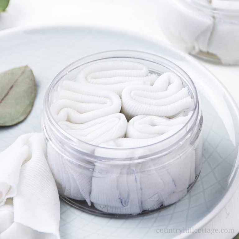 How to make easy DIY hand sanitizer wipes! The homemade antibacterial wipes recipe is made with natural organic ingredients (vodka, aloe vera, essential oils) and reusable wipes. Use the portable mini disinfectant hand wipes with alcohol for travel or when hand washing isn’t possible. Cute gift or baby shower favor. Disinfecting wipes are good for kids and classroom uses. With printable labels for the dispenser and packaging the container. #handsanitizer #essentialoils | countryhillcottage.com