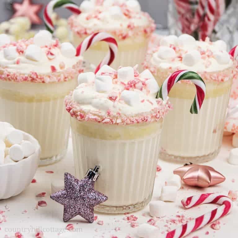 Peppermint white hot chocolate! Learn how to make dairy-free peppermint hot chocolate from scratch with just 10 minutes prep. This vegan white hot chocolate recipe is a wonderful hot drink for the holiday season. The easy homemade Christmas hot chocolate recipe also includes options for sugar-free low-carb keto peppermint hot chocolate and healthy refined sugar-free paleo peppermint hot chocolate. #hotchocolate #pepperminthotchocolate #Christmashotchocolate #drink | countryhillcottage.com