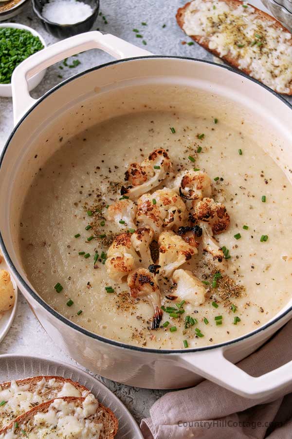 pot filled with creamy cauliflower soup without cream.