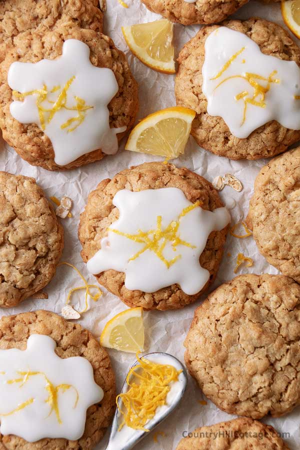 lemon oatmeal cookies on a piece of white parchment paper.